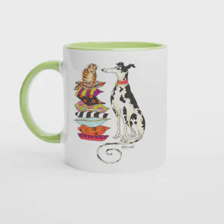 White mug with green handle and green interior, featuring cat and spotted dog illustration